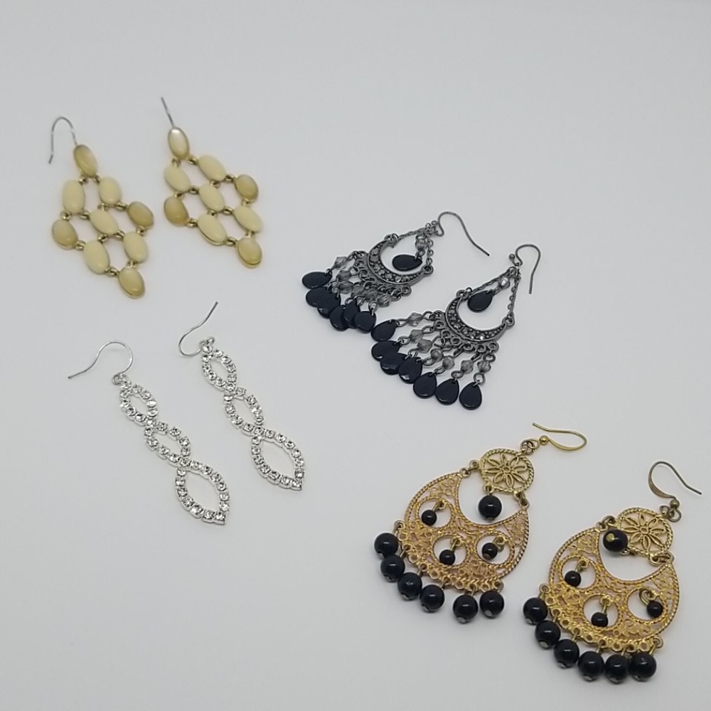 Four pairs of dangle earrings